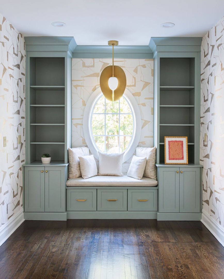 Stylish living area with soft green built-ins and geometric wallpaper in a Verona, NJ custom home project by G&L and Sons Renovations