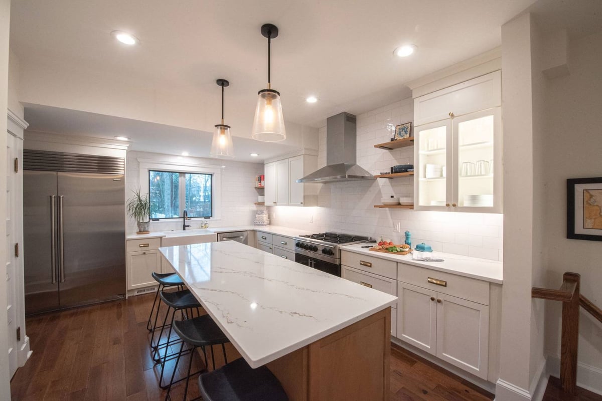 White kitchen remodel with large island by G&L and Sons Renovations in Caldwell, NJ
