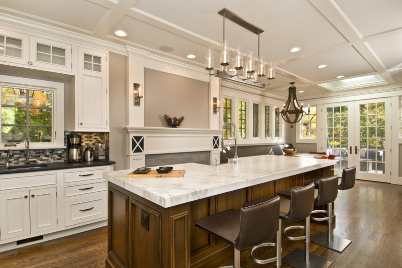 Bright custom kitchen with large island and bar seating by G&L and Sons Renovations in Caldwell, NJ