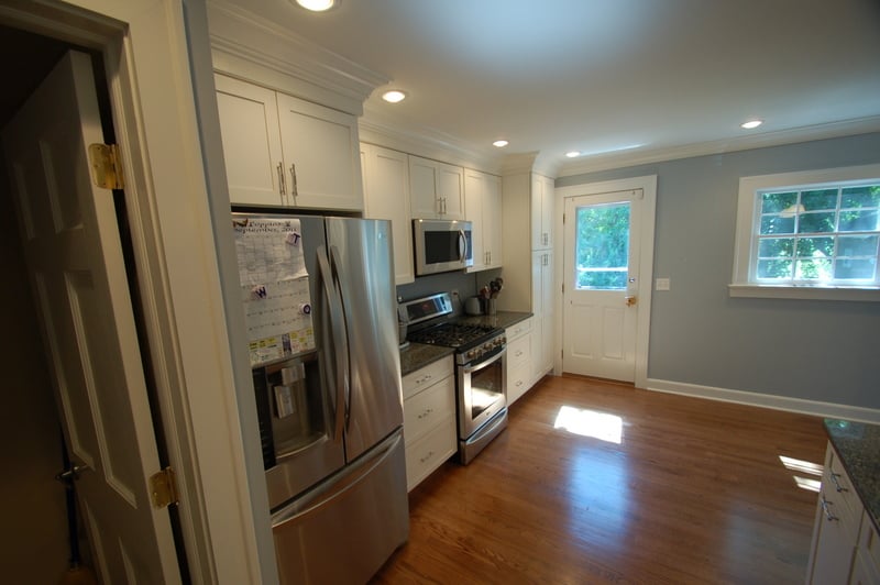 Bright white kitchen remodel with stainless steel appliances by G&L and Sons Renovations in Caldwell, NJ