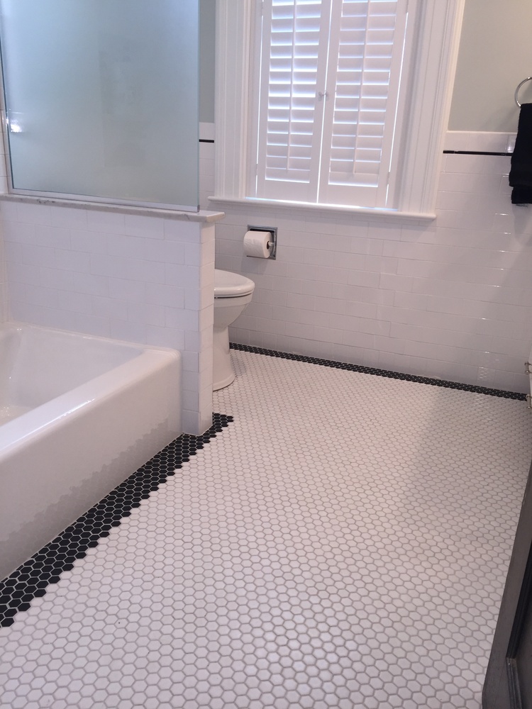 Classic bathroom remodel with hex tile flooring and white subway walls by G&L and Sons Renovations in Caldwell, NJ