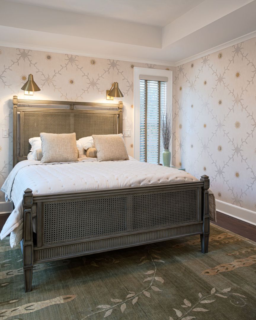 custom bedroom design with woven bed frame and wall sconces in a house remodeled by G&amp;L and Sons Renovations in Montclair, NJ