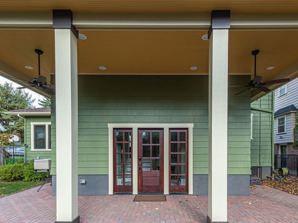 Back porch remodel with columns completed by G&L and Sons Renovations in Verona, NJ