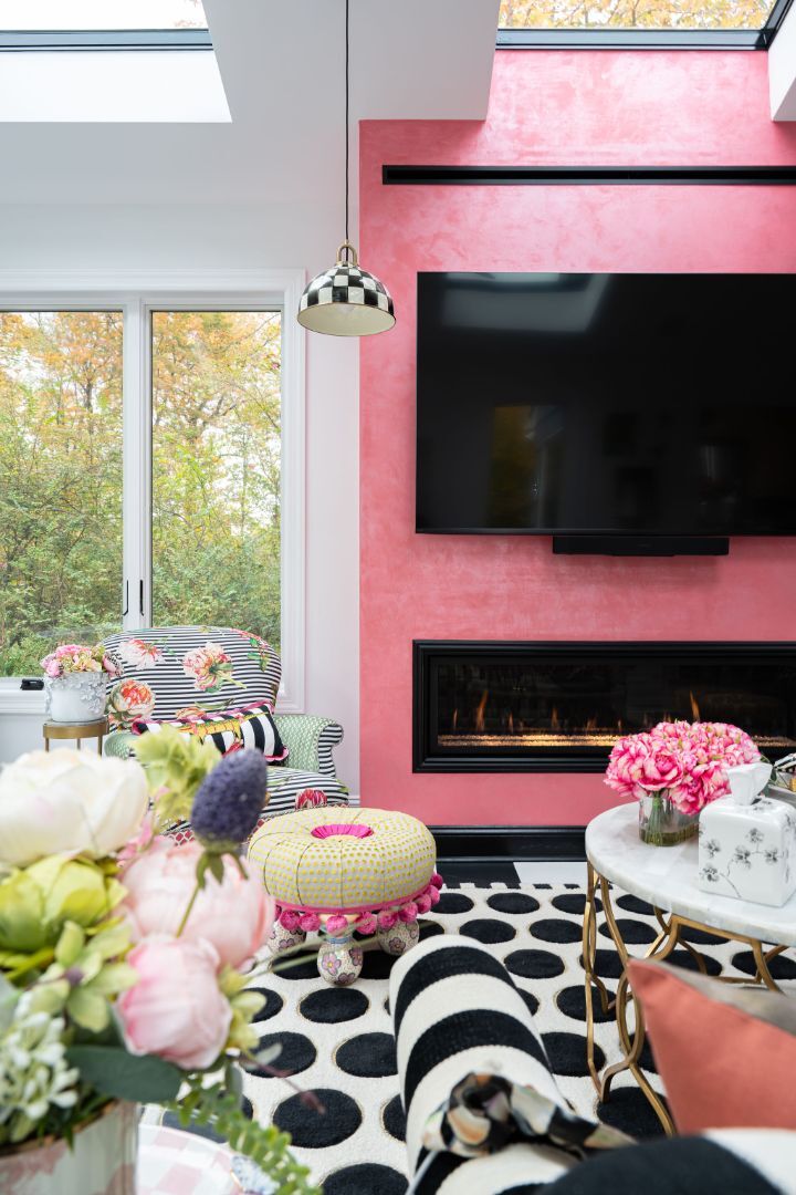 interior sunroom lounge with fireplace and skylights by G&L and Sons Renovations in Montclair, NJ